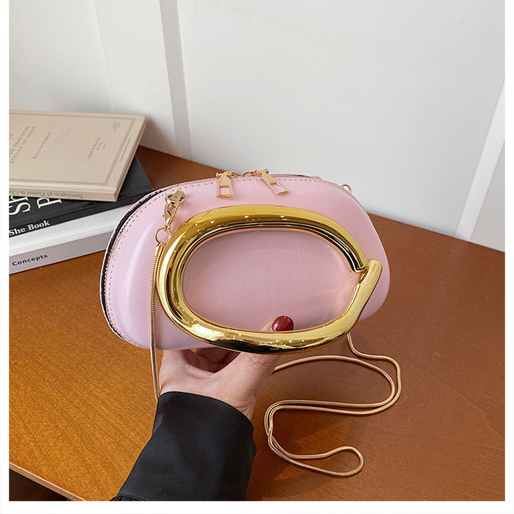 Bolsa de alta sensación para mujeres 2026 primavera nueva bolsa de brazo de viaje de moda simple nicho de diseño de hombro mochila
