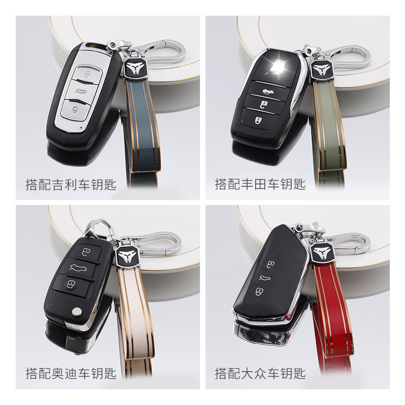 新しいtpuメッキの金の縁のキーホルダーの自動車のキーホルダーのペンダントの高品質の金属の馬蹄の掛け縄の卸売り