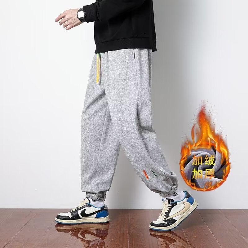 Primavera y otoño 2024 nuevos pantalones casuales para hombres, pantalones deportivos sueltos de la marca de moda juvenil, pantalones deportivos sueltos de color sólido