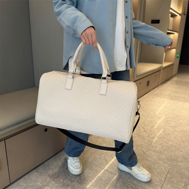 Bolsa de viaje portátil transfronteriza simple color sólido bolsa de equipaje de gran capacidad bolsa de ocio al aire libre bolsa de natación al por mayor