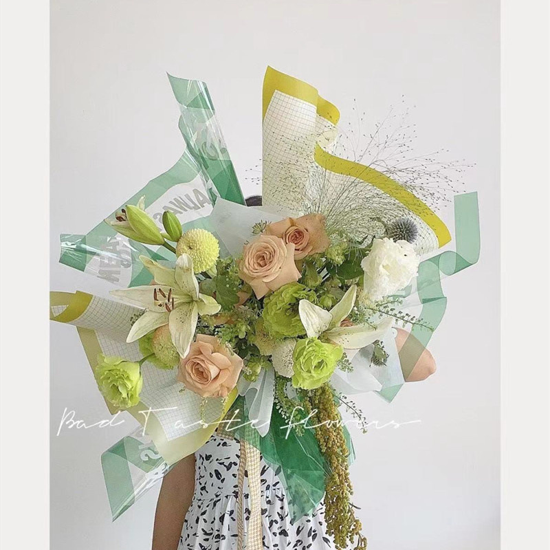 Flores de fábrica de fiesta al por mayor nuevo marco de red flor de papel de envoltura impermeable papel de niebla florista ramo de papel de envoltura flor