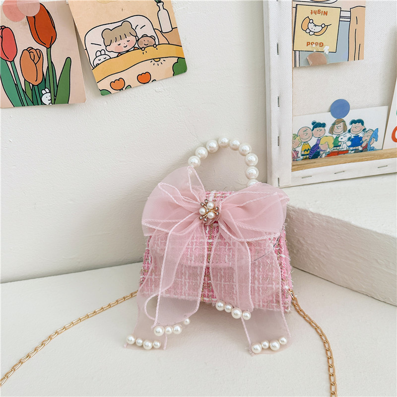 Bolsos de moda de moda para niños, arco de arco, nuevo bolso, cambio de chicas, mochila transfronteriza