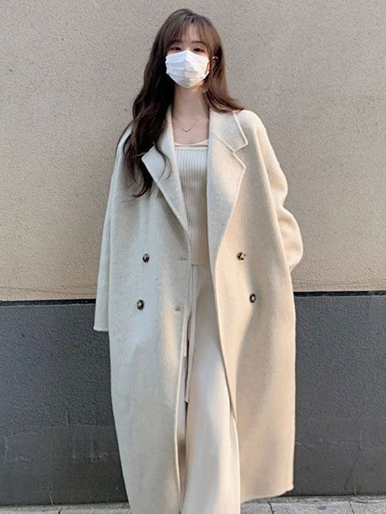ピンクのドーパミンの中の長い毛はコートの婦人服の秋冬の韓系の気質の小さい背の雰囲気感のゆったりしているコートです。|undefined