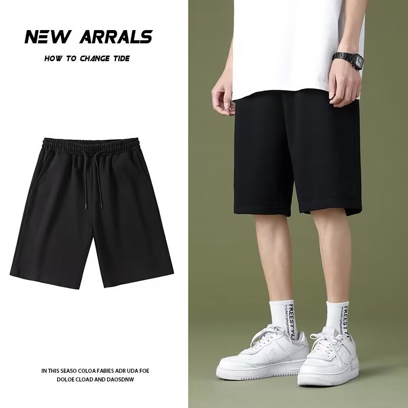 Pantalonos de cinco puntos de color sólido para parejas de moda masculinas delgados cintura elástica de verano universal simple adelgazamiento deportivo ocio