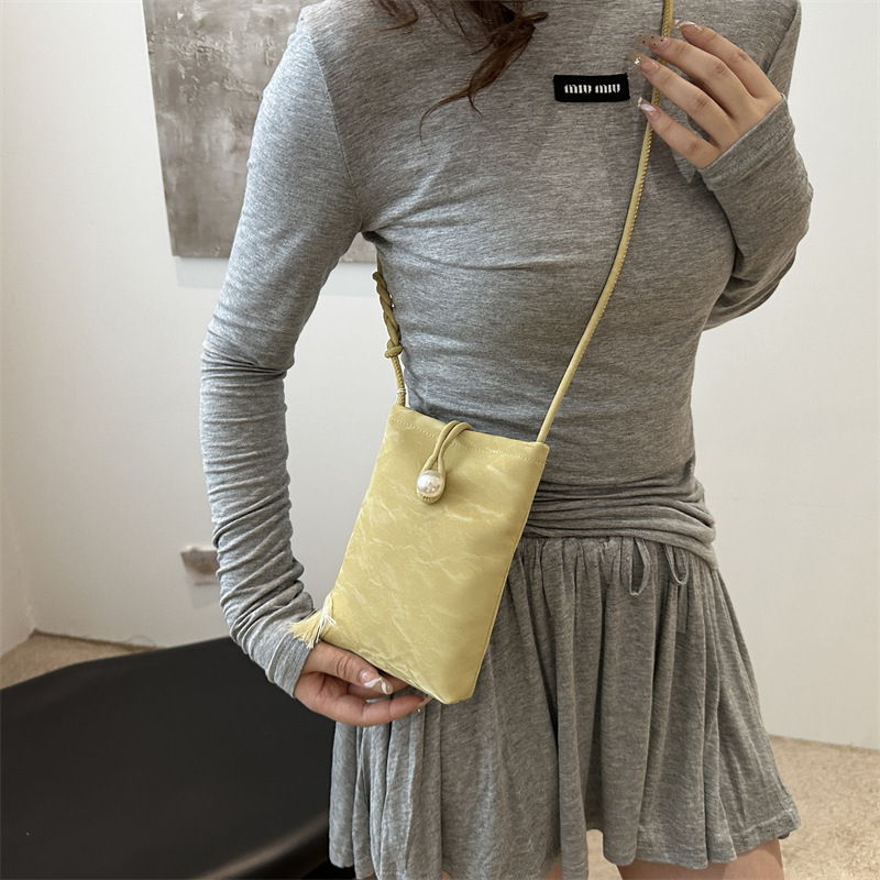 Nueva bolso chino para mujeres 2024 verano nuevo estilo nacional bolso de mano pequeño bolso ligero con cheongsam perla bolso móvil