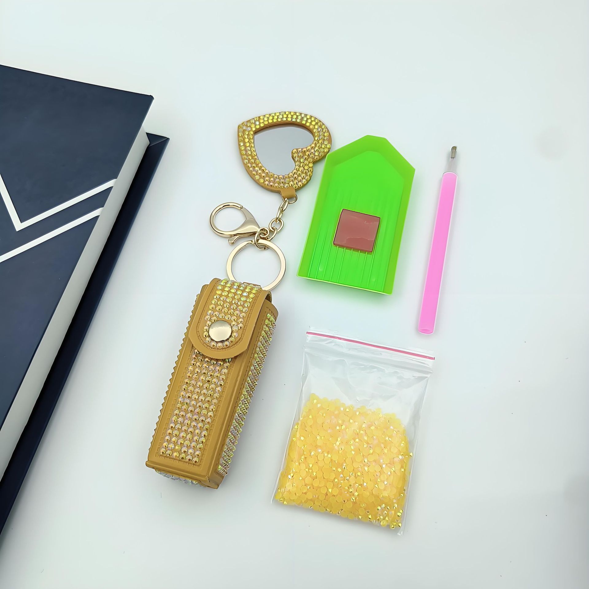 Bolso de cambio transfronterizo sobre rojo espejo creativo llavero colgante pequeño PU cuero bolso de coche accesorios accesorios en stock