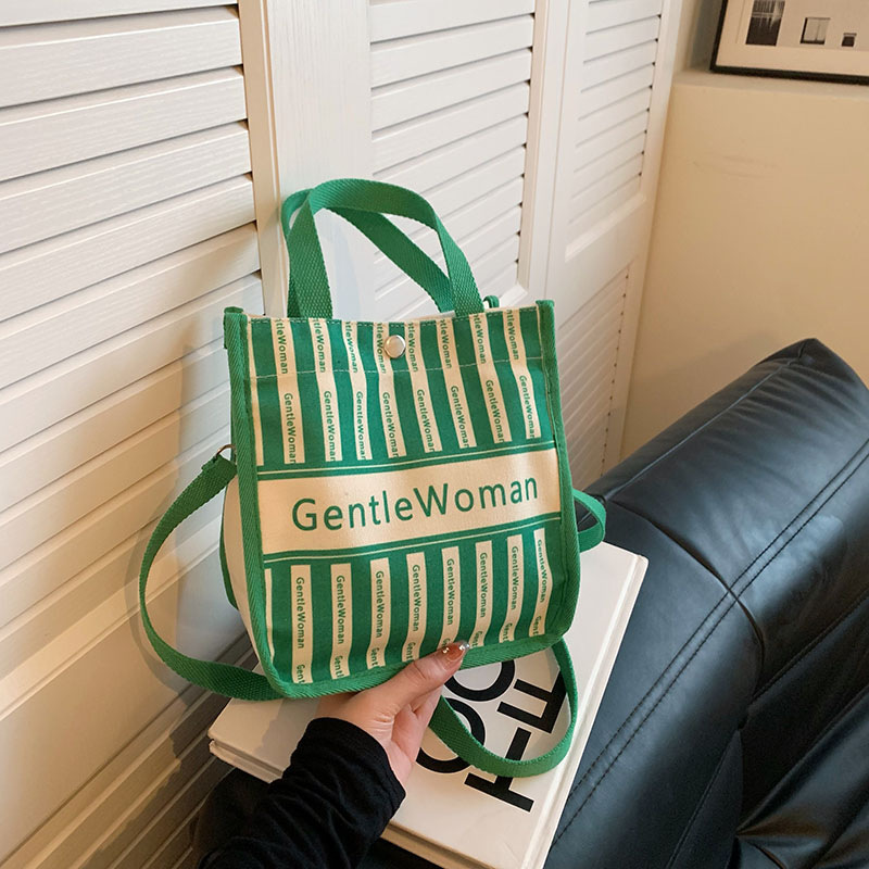 Moda rayas bolsa de lona para mujeres 2023 nueva carta impresión portátil bolsa de compras bolso de hombro al por mayor