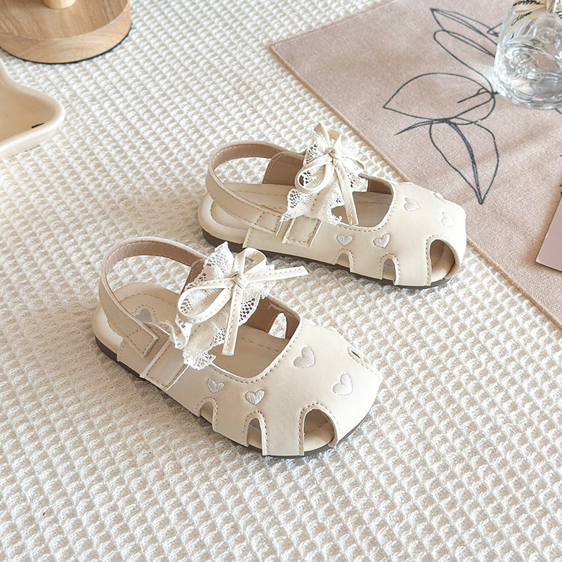 Sandálias huecas para niños 2026 verano nuevo estilo de moda para niñas zapatos de cabeza de bolsillo único para niños zapatos de princesa de arco image 5