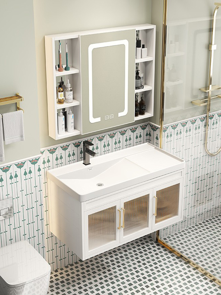 Luz nórdica de lujo espacio de aluminio gabinete de baño mesa de lavado lavabo gabinete de baño lavabo combinación de cerámica cuenca integrada