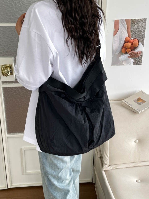 2026 nuevo bolso de nylon coreano ligero de gran capacidad bolso de tela de viaje casual versátil bolso de hombro resistente al desgaste mujer