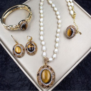 Natural tiger eye stone four-piece set of jewelry necklace bracelet earrings ring freshwater special-shaped pearl sweater chain jewelry