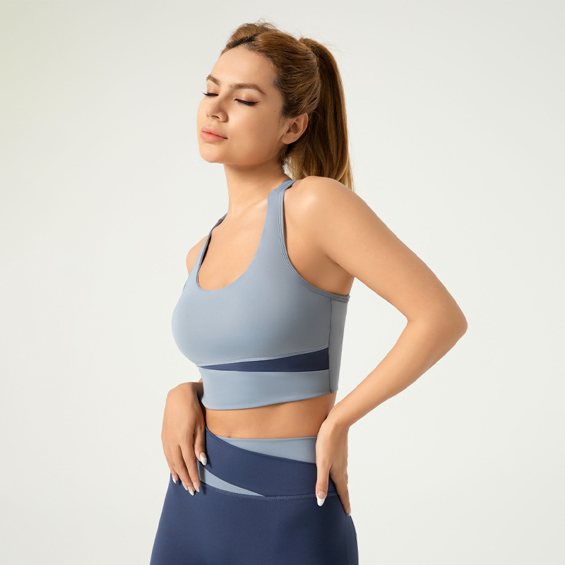 Área transfronteriza de Juyitang Ropa interior deportiva empalmada Chaleco de fitness a prueba de golpes de alta resistencia para mujer