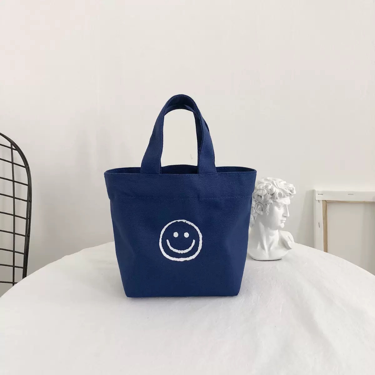 Navy blue smiley handbag 17*20*26