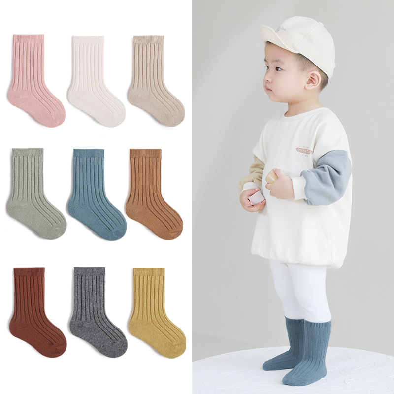 2022 Otoño e Invierno nuevos calcetines para niños calcetines de bebé sin hueso de doble aguja de color sólido Corea del Sur estilo de moda niños y niñas calcetines de media pantorrilla