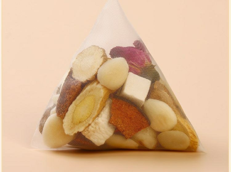 Xingren Qibai Drink Almond Seven White Herbal Tea 100g Bag 10 Cold Brew Sachets Sugar Free Wellness Blend in use