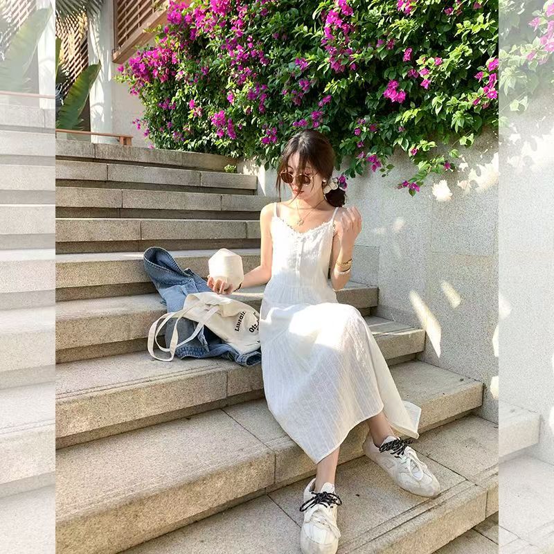Gentle First Love White Sling dress Women's 2025 Spring New Seaside Vacation Slim Dress