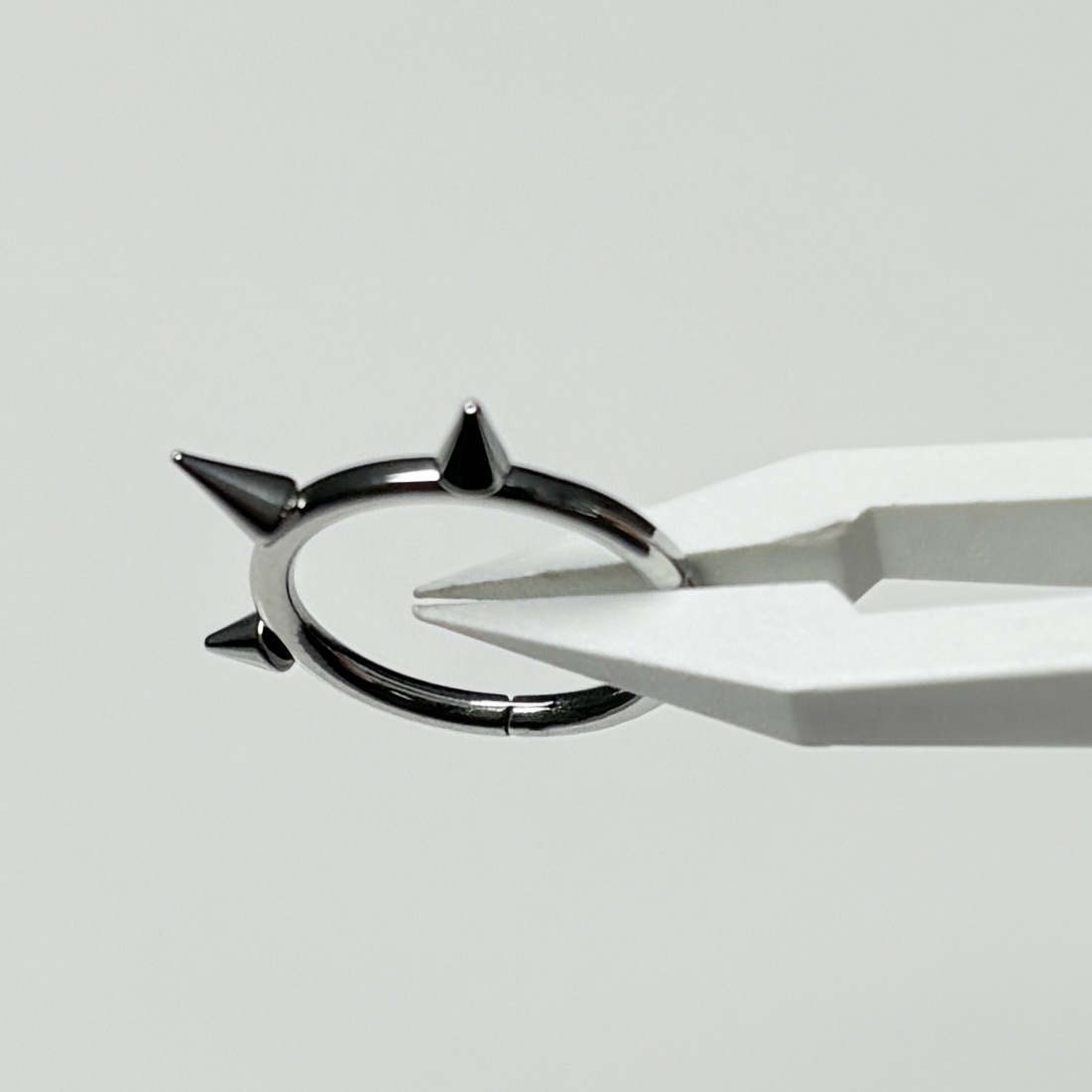 Pointed labret stud close-up product detail