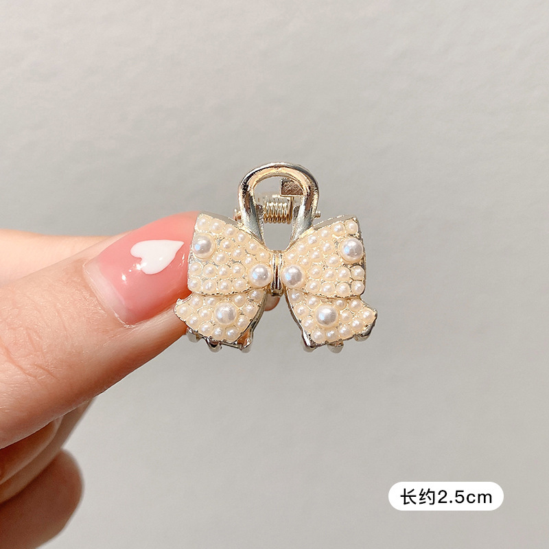 Pequeñas pinzas de cabello de perla temperamento feminino medio agarrado pinzas de cabello de borde pequeño adornamiento de cabeza de alto nivel no lastimar pinzas de cabello