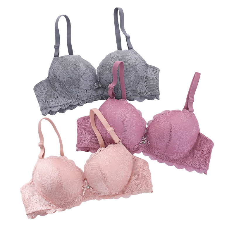 Fábrica de stock pequeño pecho grueso sujetador sexy encaje reunido ropa interior de mujer con anillo de acero sobre el bra de caída