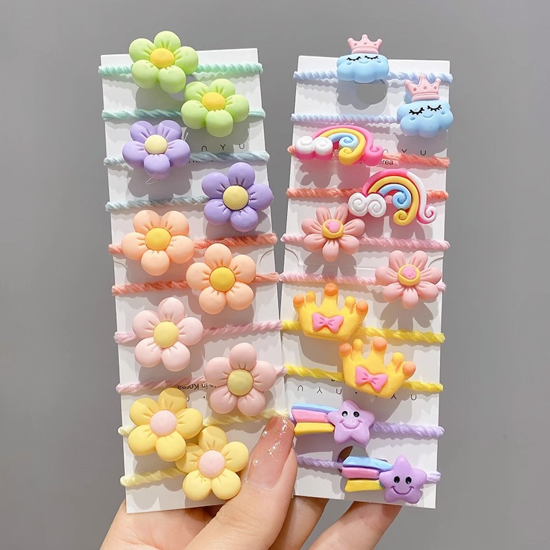 La cuerda del pelo del bebé de las muchachas de la banda de goma de los niños no lastima el pelo Los accesorios del pelo del pulgar del tamaño pequeño atan la banda de goma del pelo