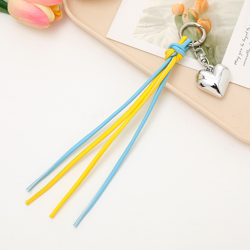 Nuevo tipo de cuerdas de cuero PU llavero colgante in bolsos de moda colgante cadena accesorios DIY tejido a mano