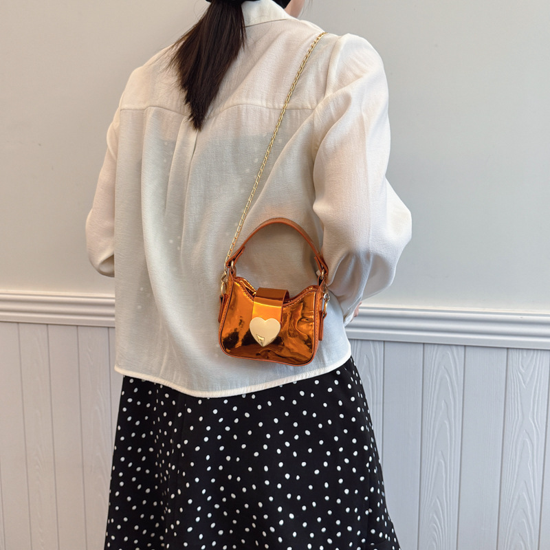 Bolso de hombro de niña brillante láser de moda, dulce y cariñoso mini bolso de bebé, nuevo bolso de cadena para niños, marea