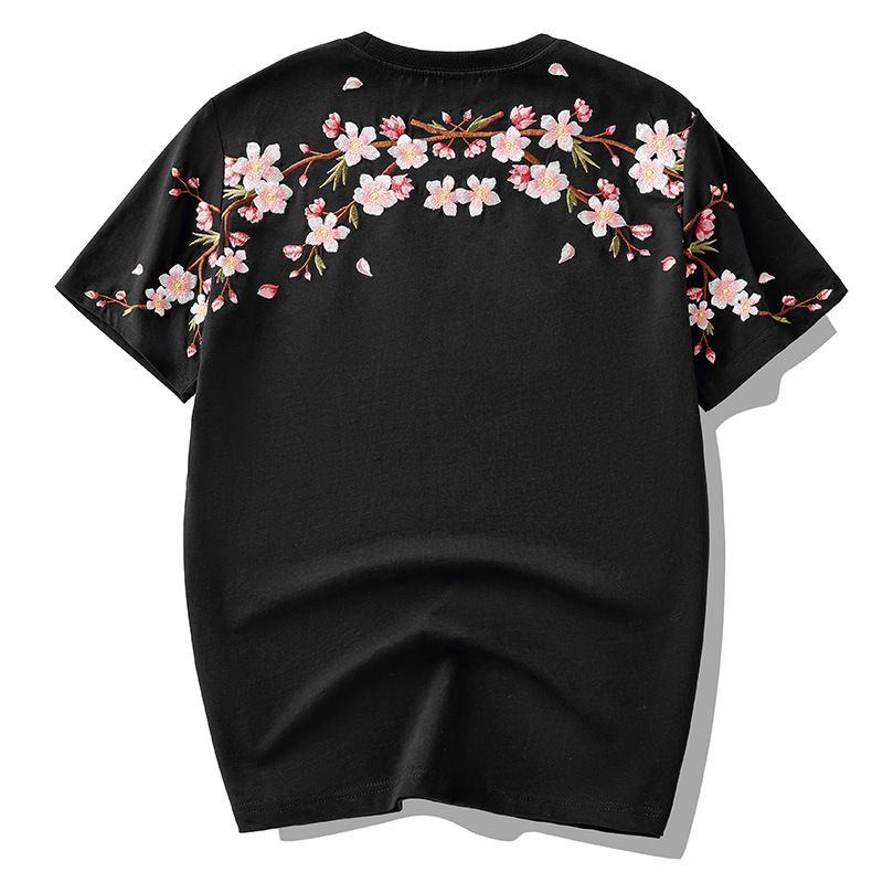 2025 primavera y verano nueva marea nacional marca de moda china suelta flor de ciruelo bordado camiseta de manga corta pareja masculina media manga de verano