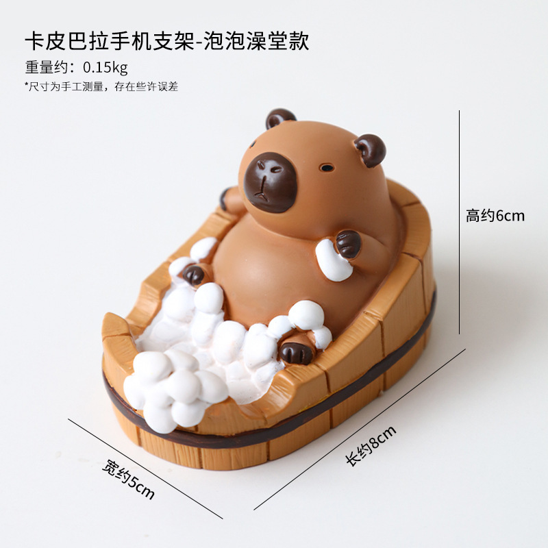 Dibujos animados linda celebridad de Internet Kapibala soporte para teléfono móvil decoración escritorio de oficina estación perezosa soporte plano artefacto