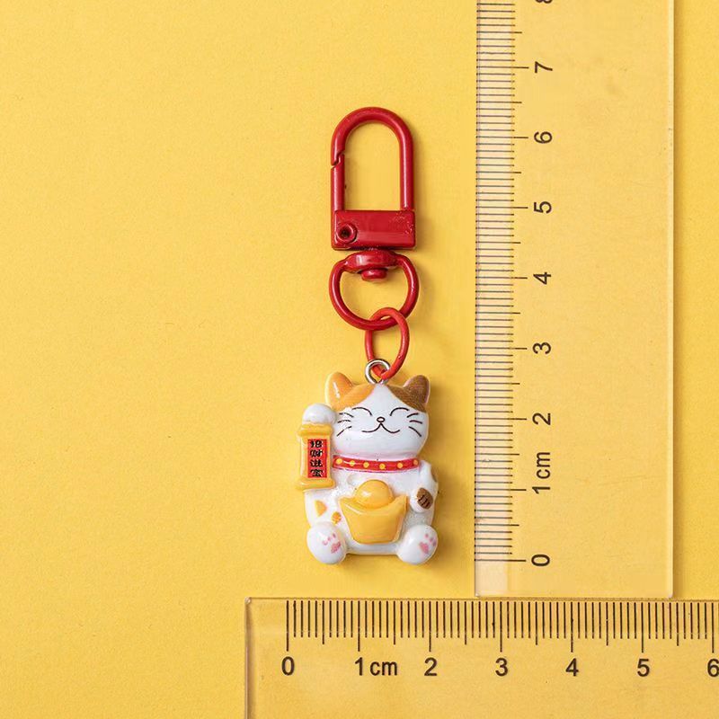 Cute mini gato pequeño colgante llavero yuanbao bolsas de Año Nuevo chino artesanías de resina regalos de decoración