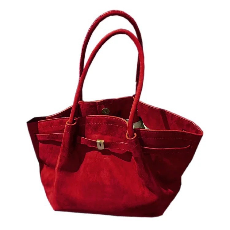 Bolsos de albóndigas de gran capacidad de muntjac rojo estilo femenino 2025 nuevo sentido de alta gama bolsos de bodas de novia de otoño e invierno