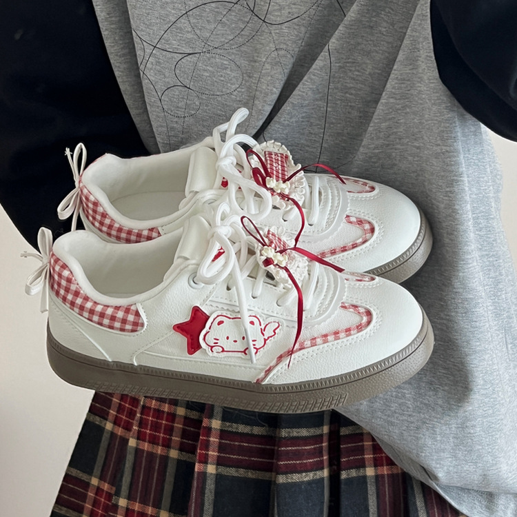 Zapatos de skate de arco para mujeres otoño de 2025 nuevos zapatos blancos transpirables de nicho para mujeres coreanas zapatos de entrenamiento moral para mujeres