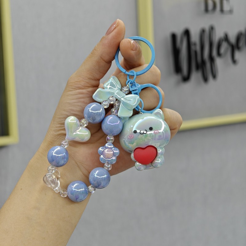 Galvanoplastia abrazo amor oso con cuentas llavero colgante acrílico muñeca colgante garra máquina muñeca regalo al por mayor