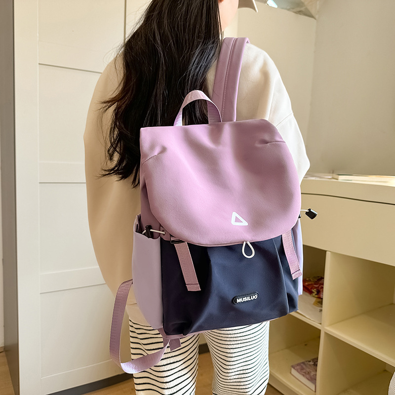 色にぶつかる流行のリュックサックは男女卸売りして出勤します。|undefined