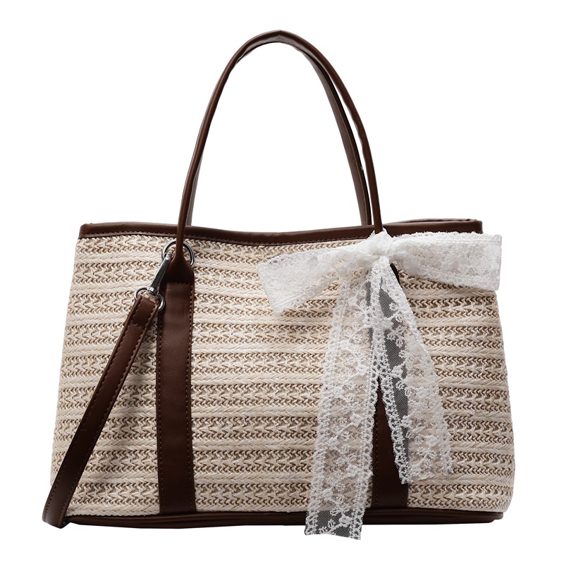 Paja tejida de color bolso de mano 2026 nuevo estilo transfronterizo vacaciones de estilo de alta calidad en la playa bolso de hombro