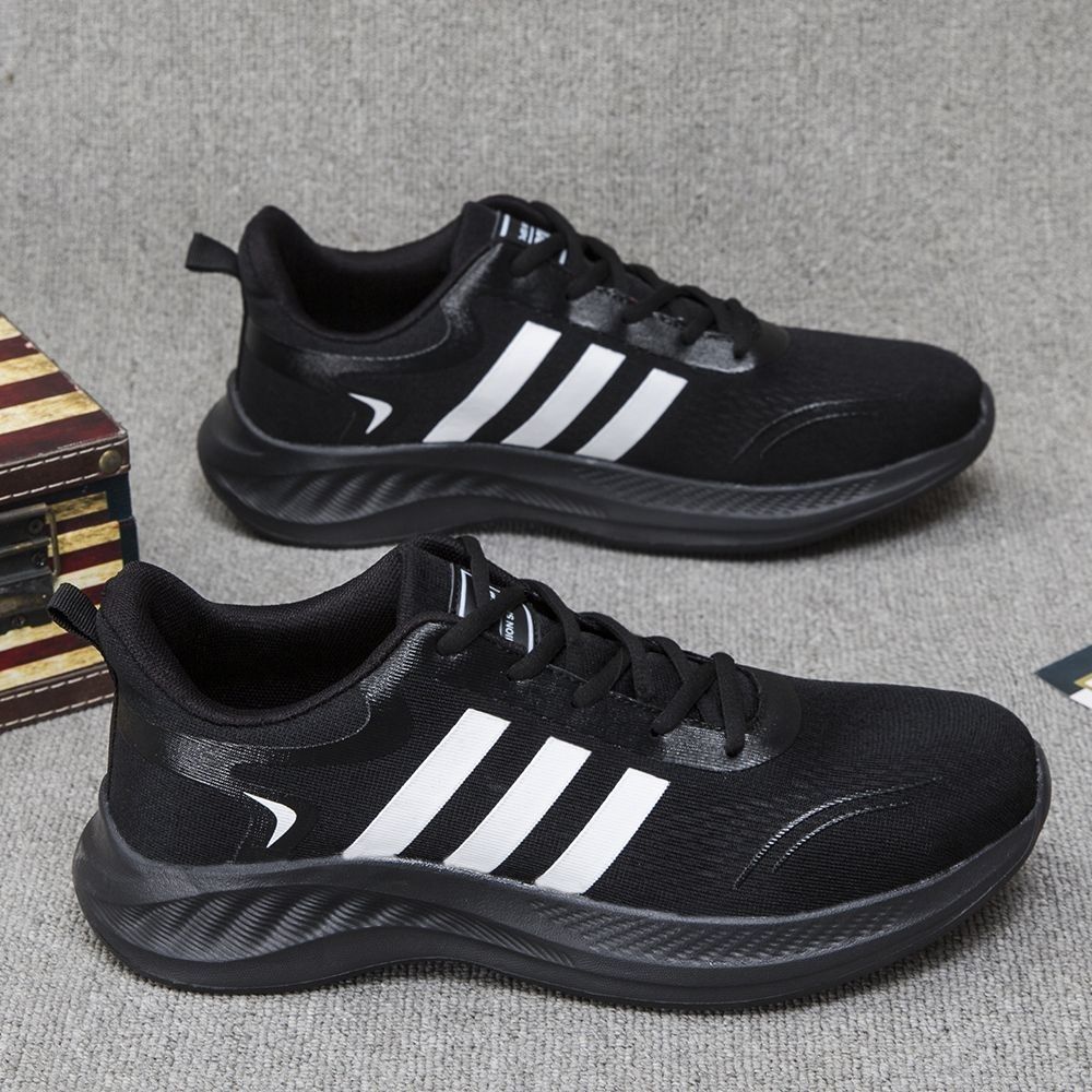 Verano nuevo estilo zapatos deportivos de talla grande estilo pareja superficie de malla de alambre de pescado pies ultraligeros y no cansados zapatos casuales de hombre para correr de todo fósforo