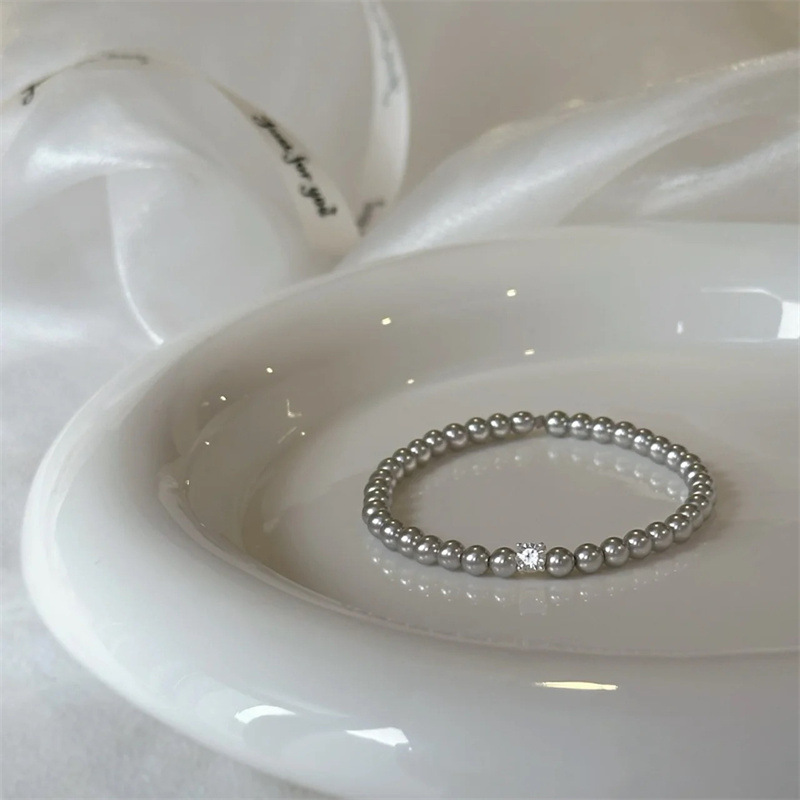 Pulsera de perlas de circón Pulsera de temperamento simple y elegante francesa Moda de lujo ligero Retro de alta gama Joyas al por mayor para mujer