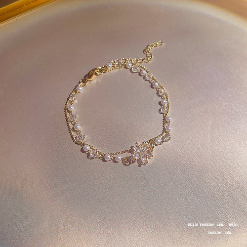 ins trendy titanium steel double-layered pearl bracelet for women super flash exquisite zircon flower pendant bracelet Korean new hand accessories