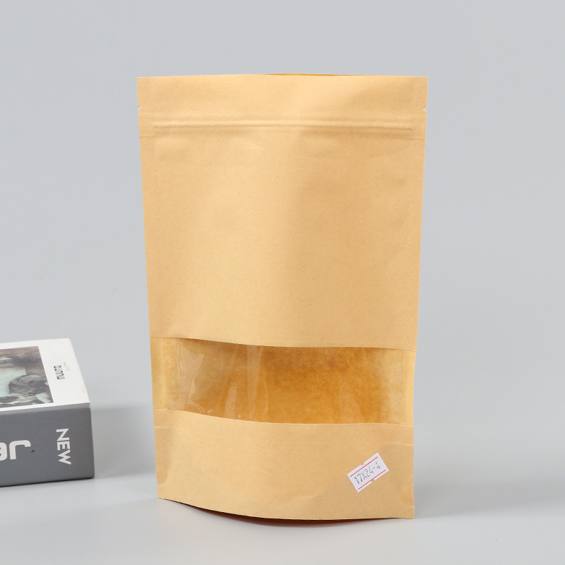 Spot bolsa de papel kraft con ventana transparente bolsa de embalaje de alimentos autosellada autoportante bolsa de té sellada de ocho lados fácil de rasgar