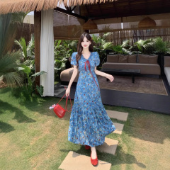 大きいサイズの婦人服の太ったmmの花の半袖はやせているワンピースの女性の夏の新型のリゾート風は腰の長いスカートを収めます。
