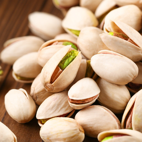 Nuts in bulk, mixed macadamia nuts, dried fruits, roasted seeds and nuts, pistachios, almonds, snacks, wholesale for the New Year.