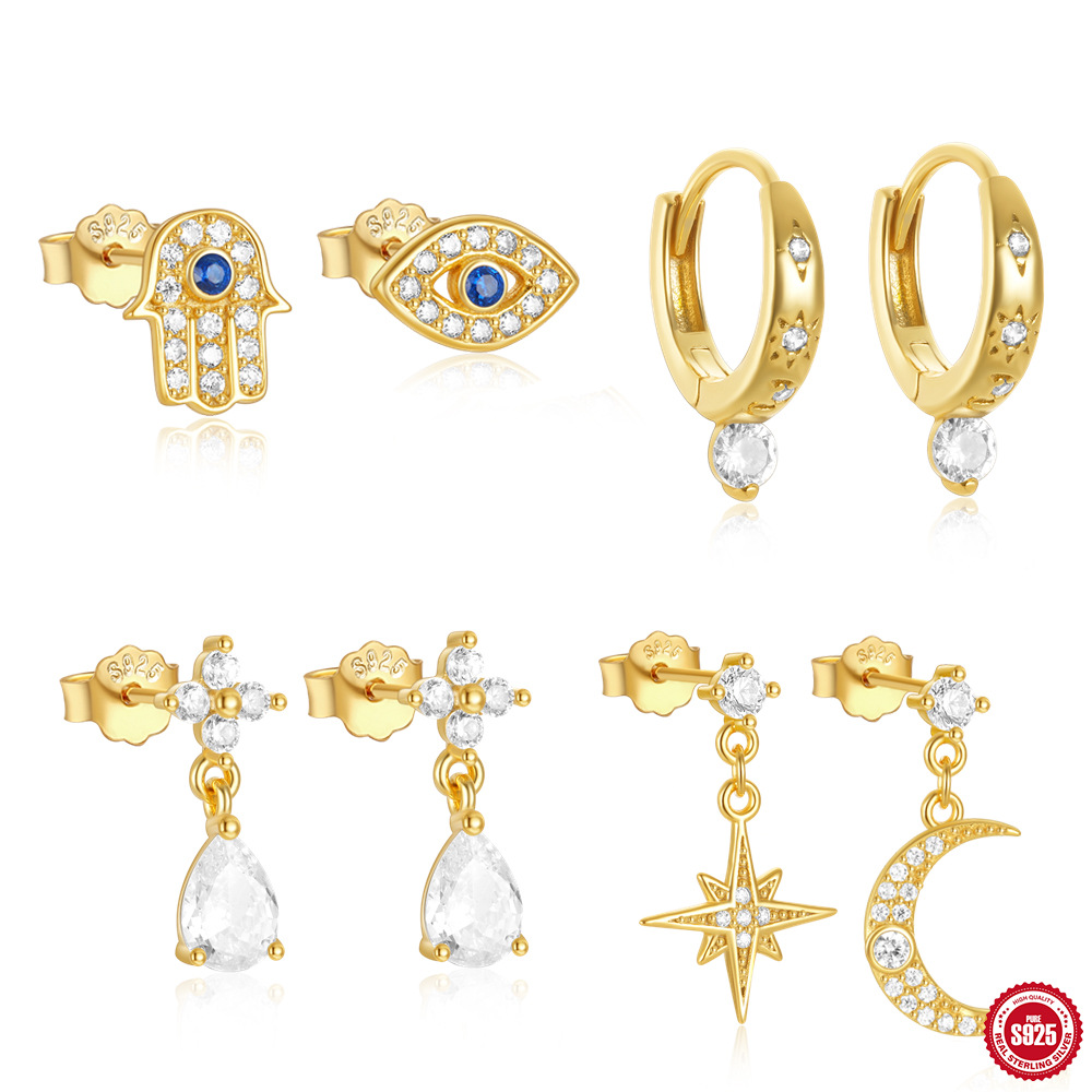 S925 plata de ley uso diario asimétrico estrella y luna ojo de diablo aretes de todo fósforo moda europea y americana venta caliente
