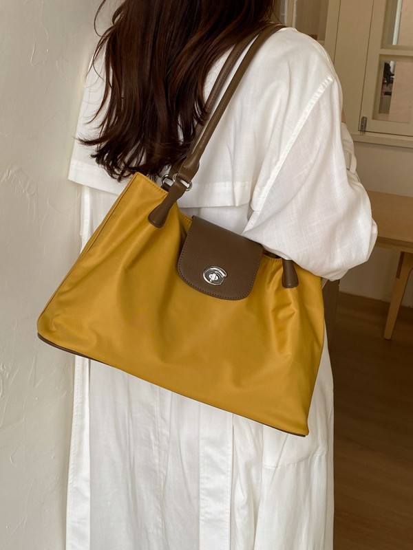 Bolsa de alta calidad de gran capacidad para mujeres 2026 verano nuevo estilo ligero simple hombro brazaleta de viaje bolsa de ocio