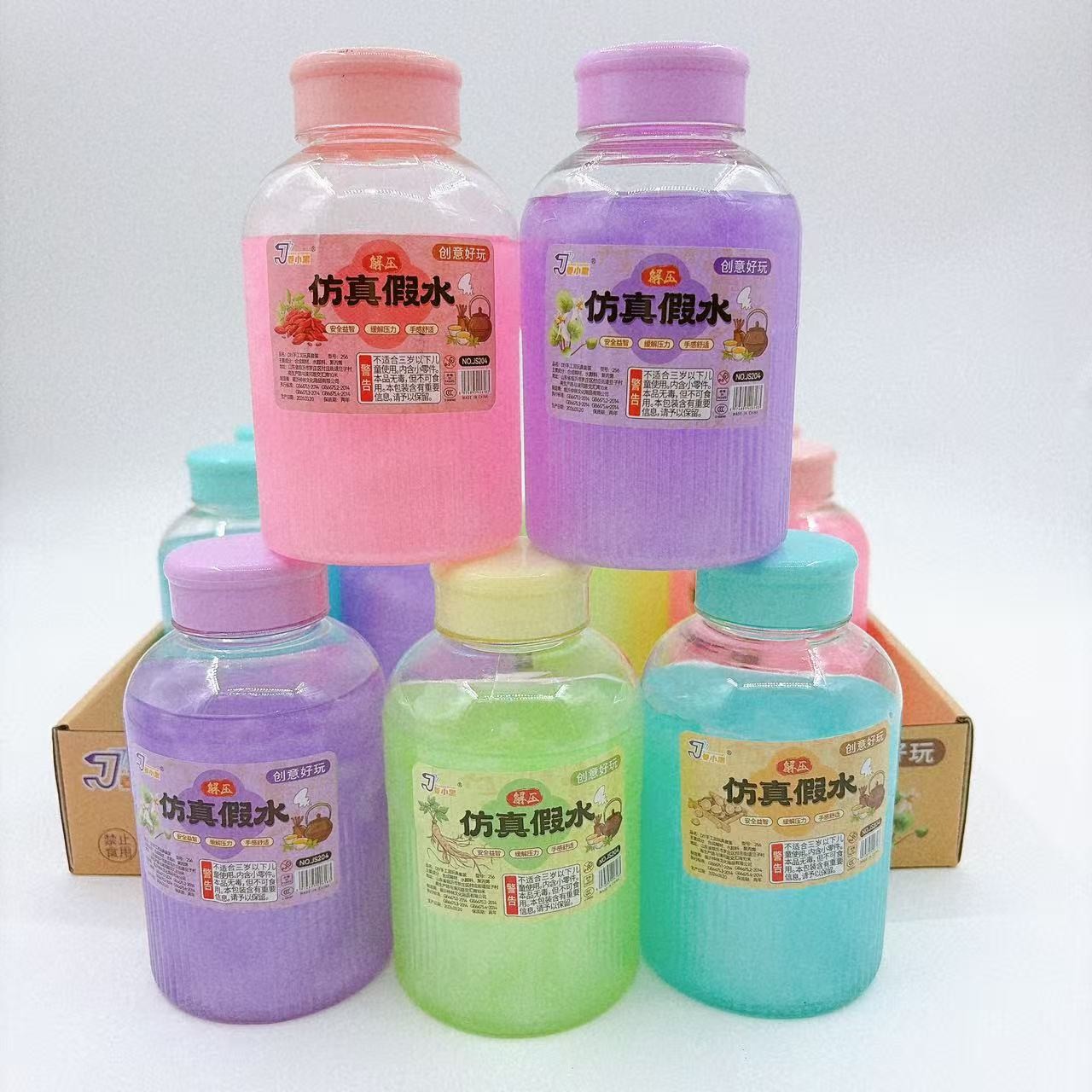 Nuevo juguete para niños, botella redonda, agua falsa, color, limo antiadherente, arcilla de color a mano, pegamento espumoso, descompresión, lote de grandes almacenes de 2 yuanes