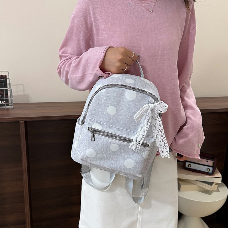 Mochila de viaje casual de moda de gran onda para estudiantes de clase, gran capacidad de personalidad, bolso de mujer simple al aire libre