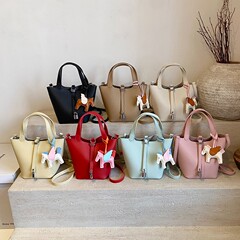 跨境外贸源头工厂时尚洋气水桶包2025新款女纯色荔枝纹单肩斜挎包