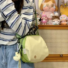 女士单肩包;中大学生书包;牛津布女包