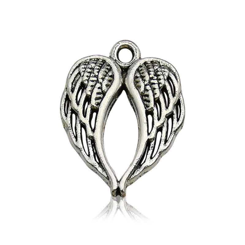 Accesorios de la joyería DIY 1 aleación de zinc accesorios en forma de corazón de plata antigua al azar accesorios de ala mixta suministro directo de fábrica