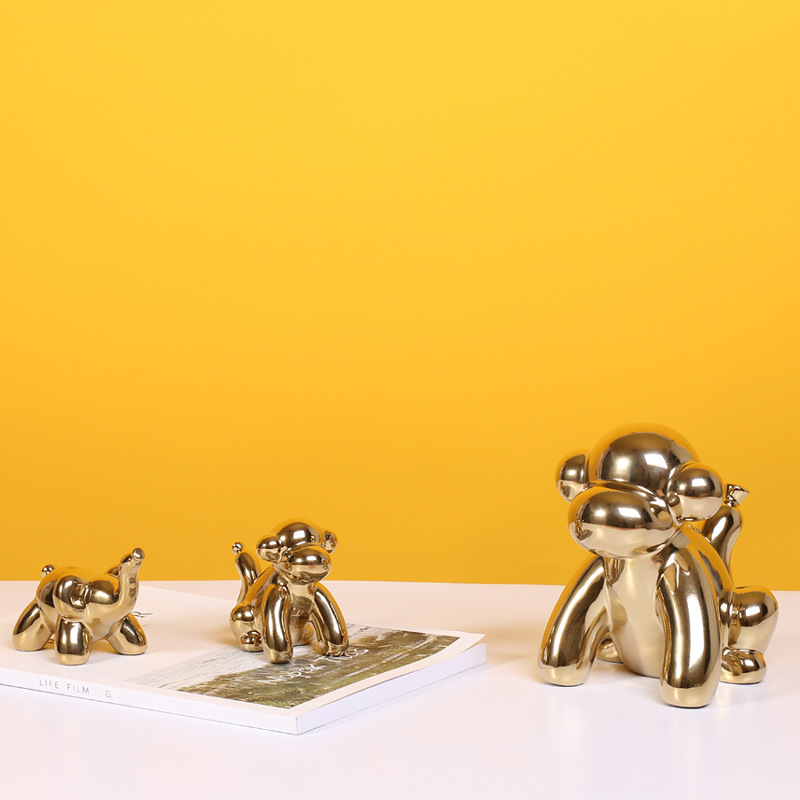 Mono de oro moderno abstracto decoración de cerámica hogar sala de estar decoración modelo habitación hotel antiguo estante Decoración