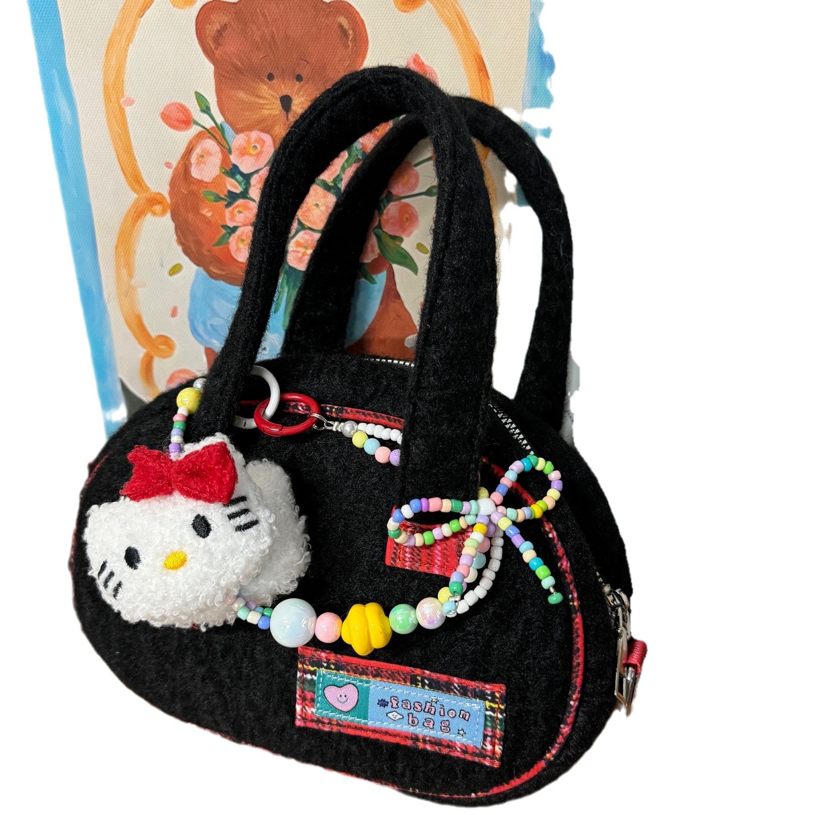 La versión coreana de la niña de invierno 2024 nuevo bolso de lana, bolso de hombro de lana de estilo extranjero.