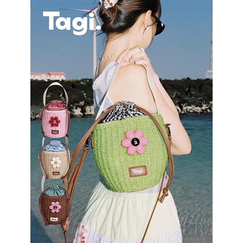 Tagi.《i》怦怦小花想象抽绳编织斜挎水桶包草编多色野餐包|undefined